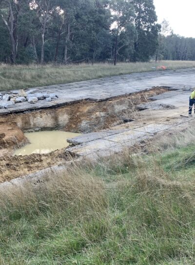 spillway repair, flash flooding damage, concrete spillway, rock bag filter unit
