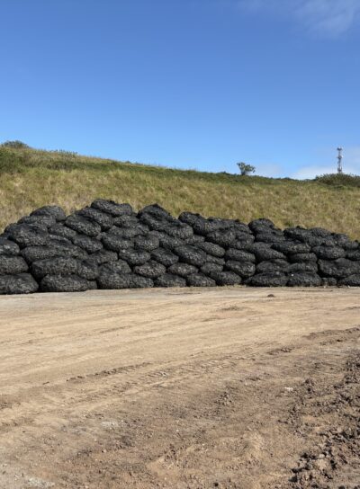 rock bag filter units stock pile, coastal protection, sand nourishment, rock bag construction site, rapid deployment, erosion control, scour protection, gabion baskets, reno mattress